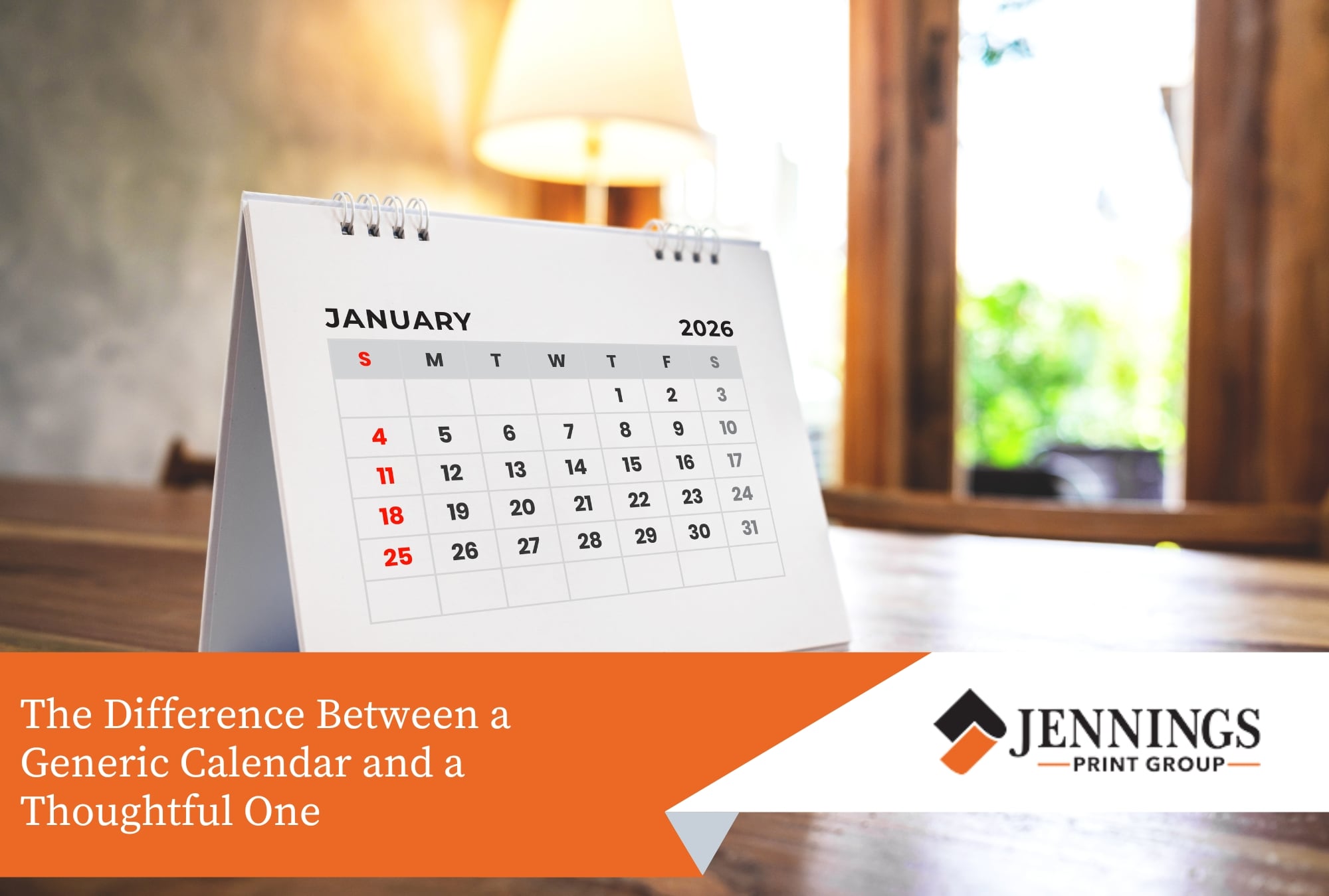 How to Use Calendars for Staff Recognition or Gifting - Calendars A white 2026 desk calendar on a wooden table